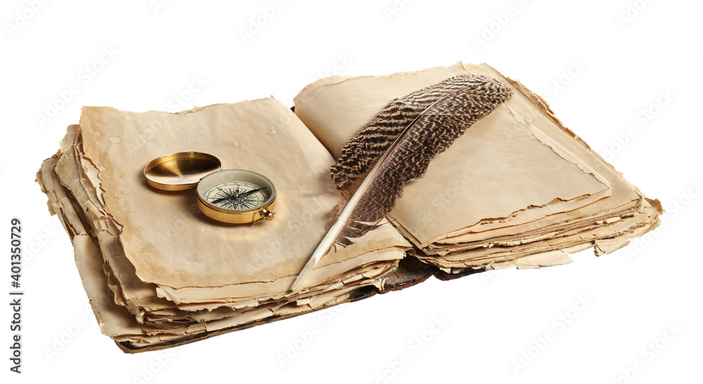 Old book with compass and feather on white background
