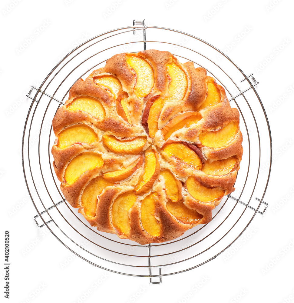 Tray with tasty peach pie on white background