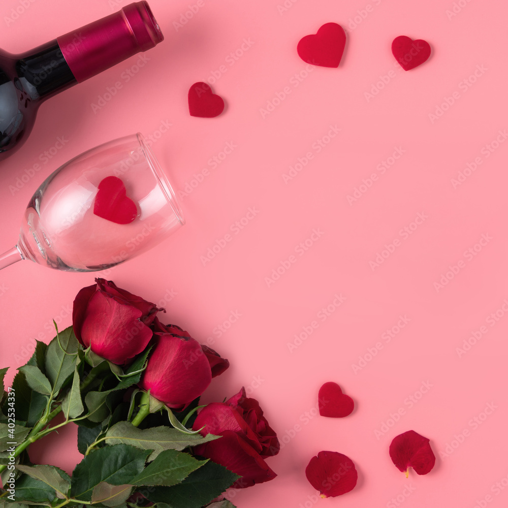 情人节约会礼物，粉色背景为葡萄酒和玫瑰概念