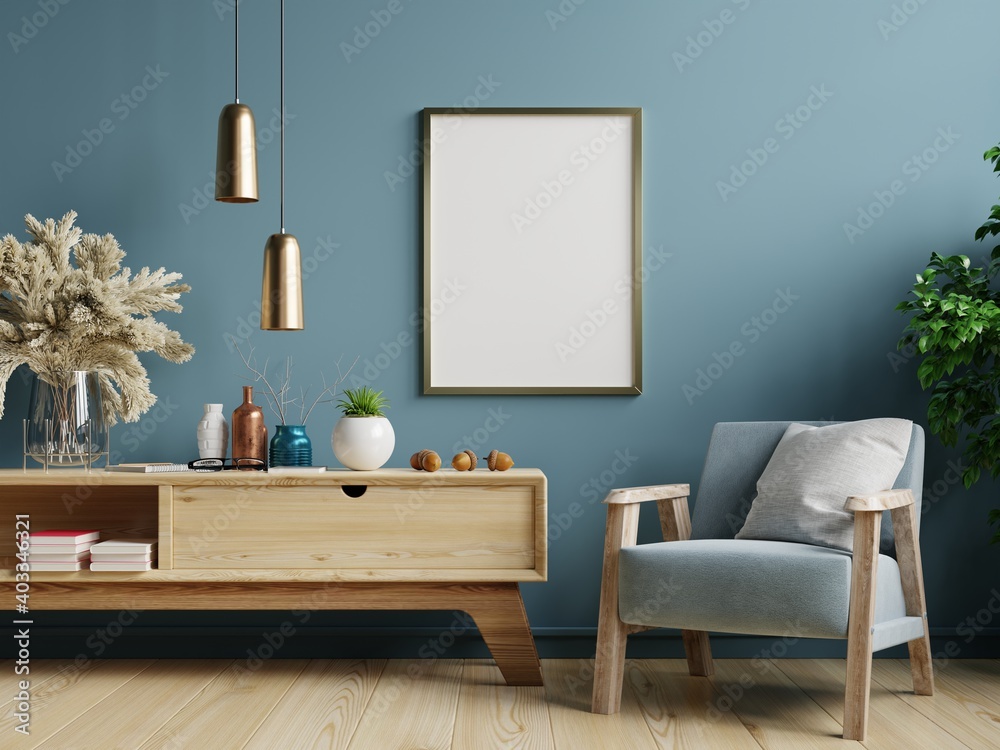 Poster mockup with vertical frames on empty dark green wall in living room interior with blue velvet