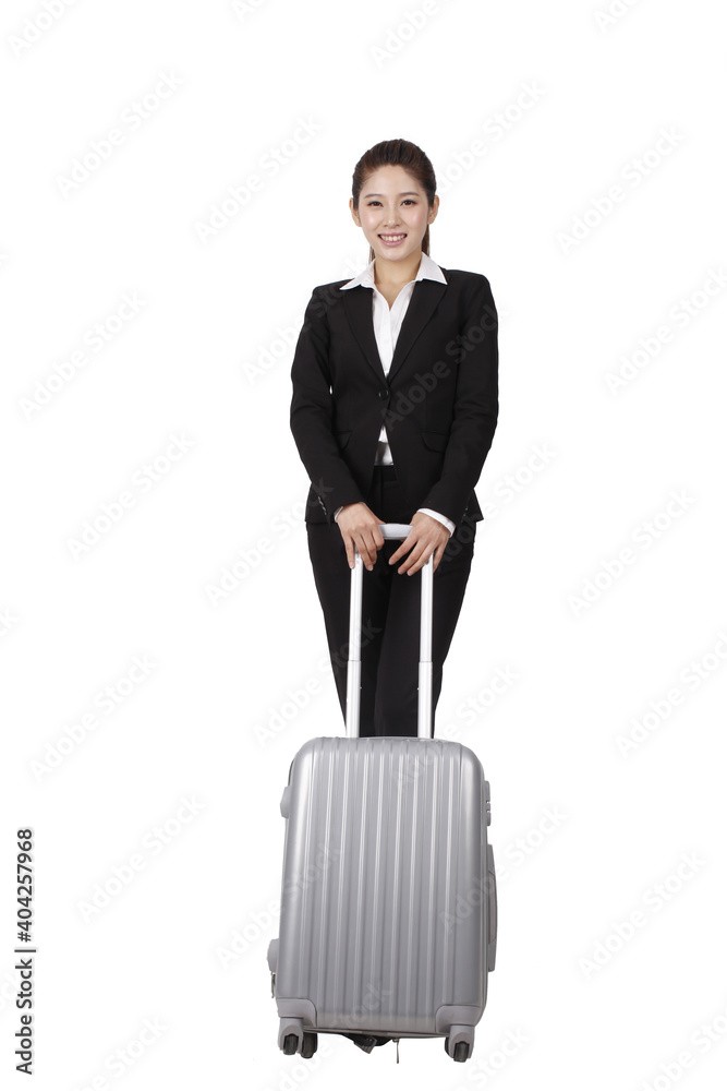 商务女性用手机拉行李箱