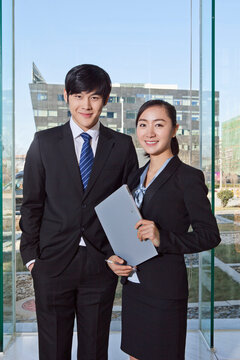 Business man and business woman working happily