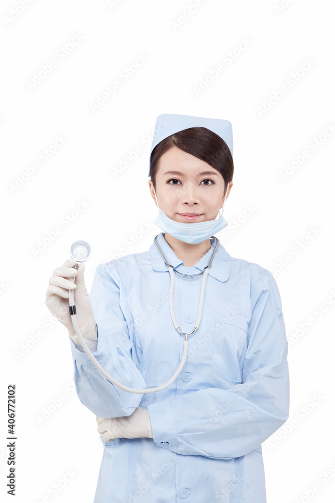 Portrait of young doctress with stethoscope holding thermometer