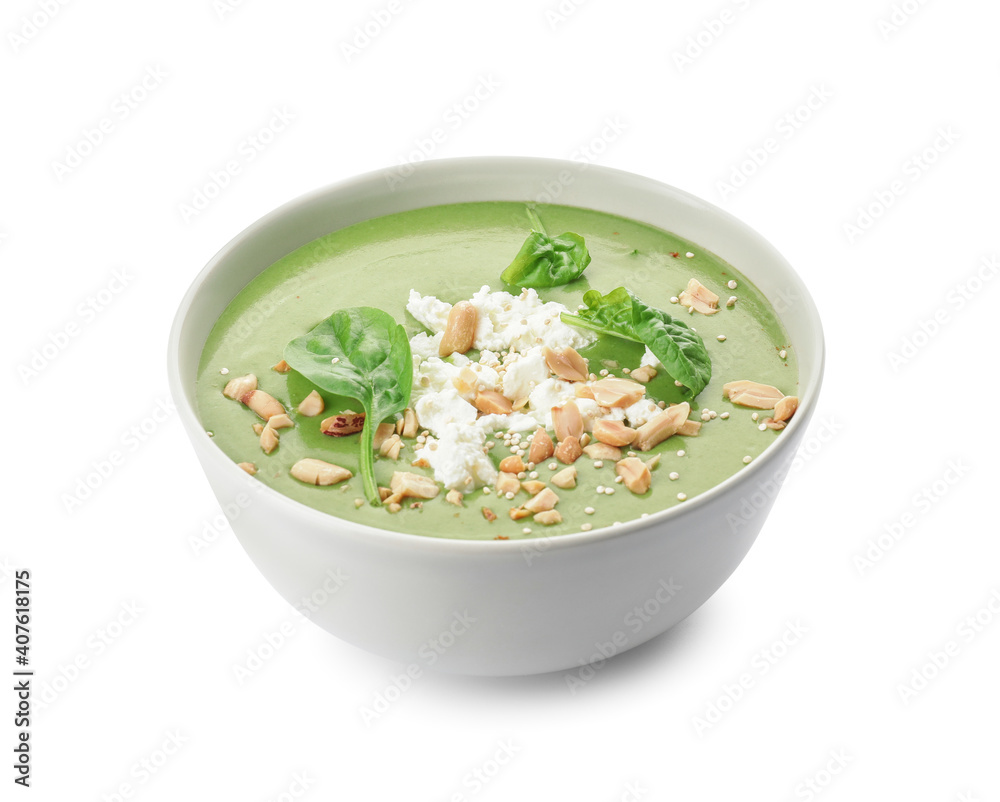Bowl with tasty spinach soup on white background