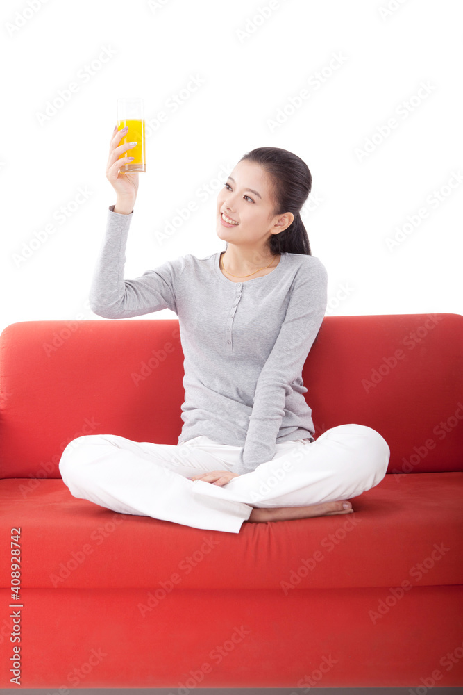 Oriental fashion woman with orange juice