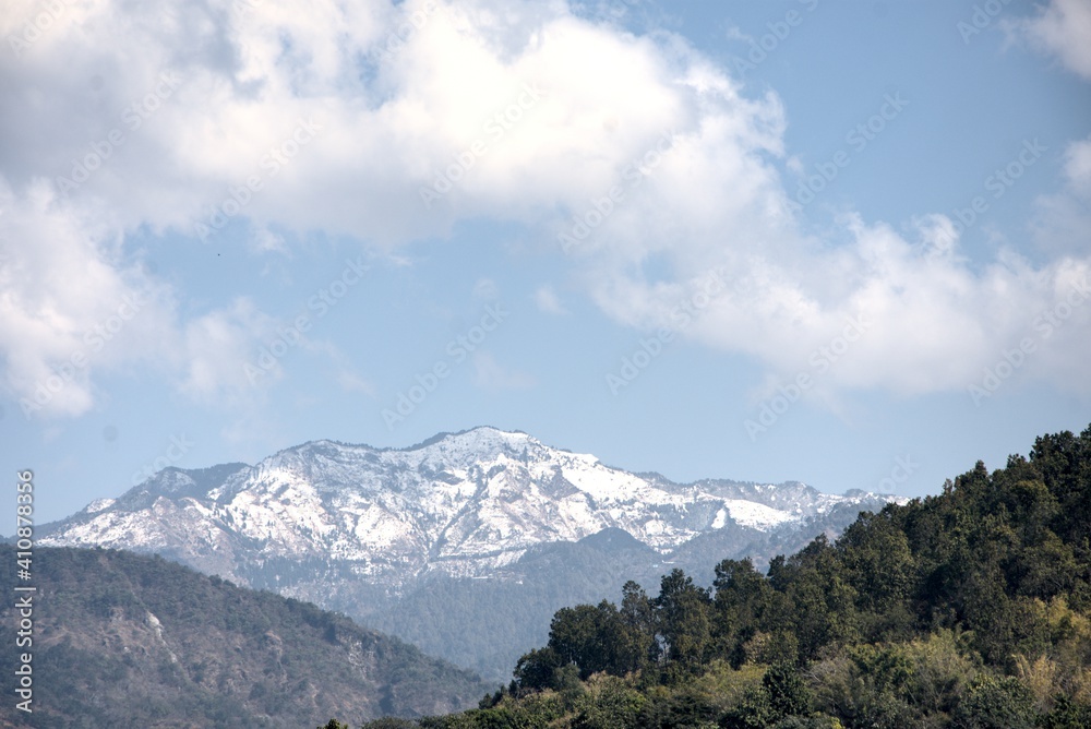 Snowfall on Mussoorie Himalayas above Dhanaulti range