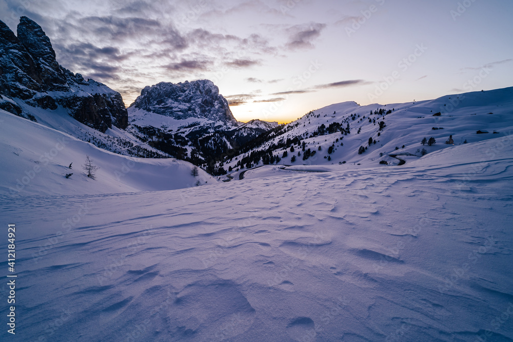 Winter sunset view of Sassolungo (Langkofel) peak in Dolomites, South Tyrol, Italy. Beautiful winter