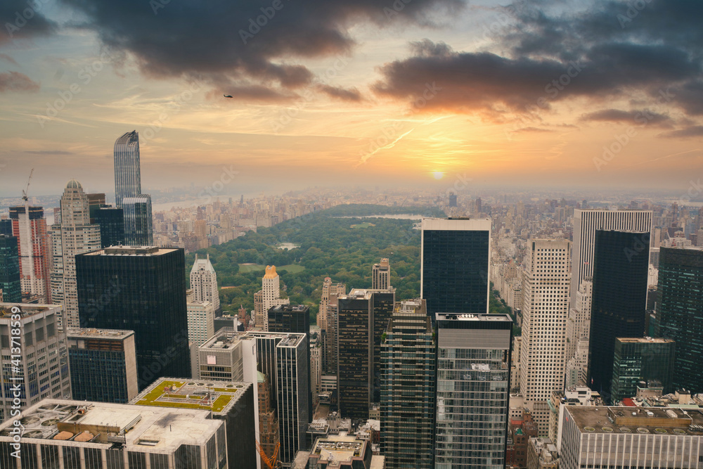 New York city central park view from rockefeller center landscape panorama at sunset with foggy clou