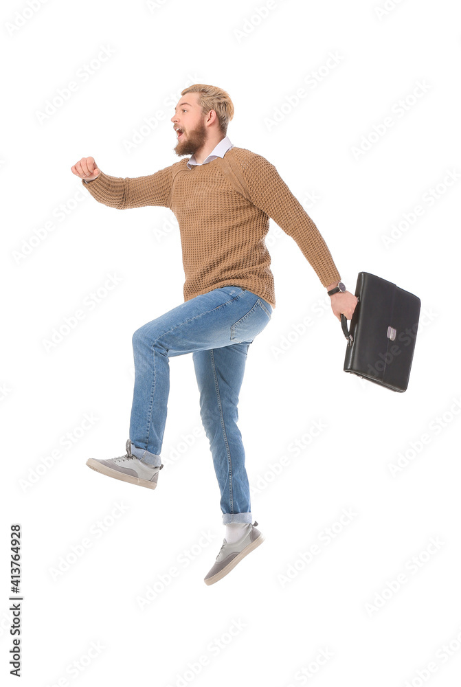 Jumping man with briefcase on white background