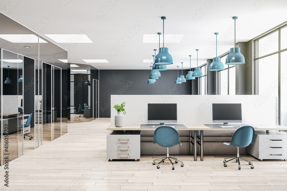 Modern open space office with light grey furniture, blue lights and chairs, concrete floor and cabin