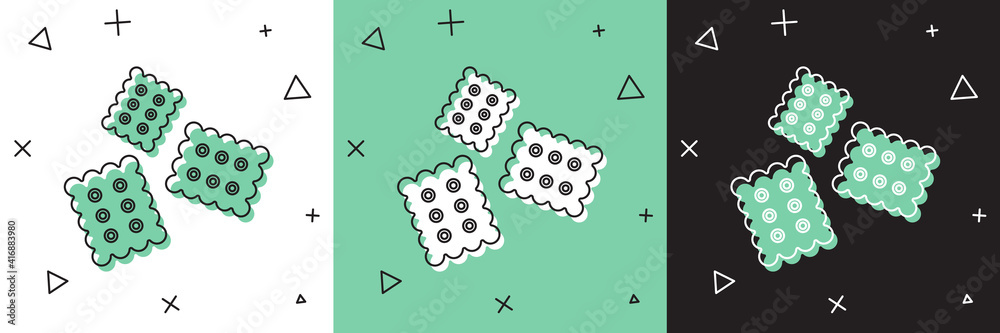 将Cracker饼干图标隔离在白色和绿色黑色背景上。甜饼干。Vector Illustr
