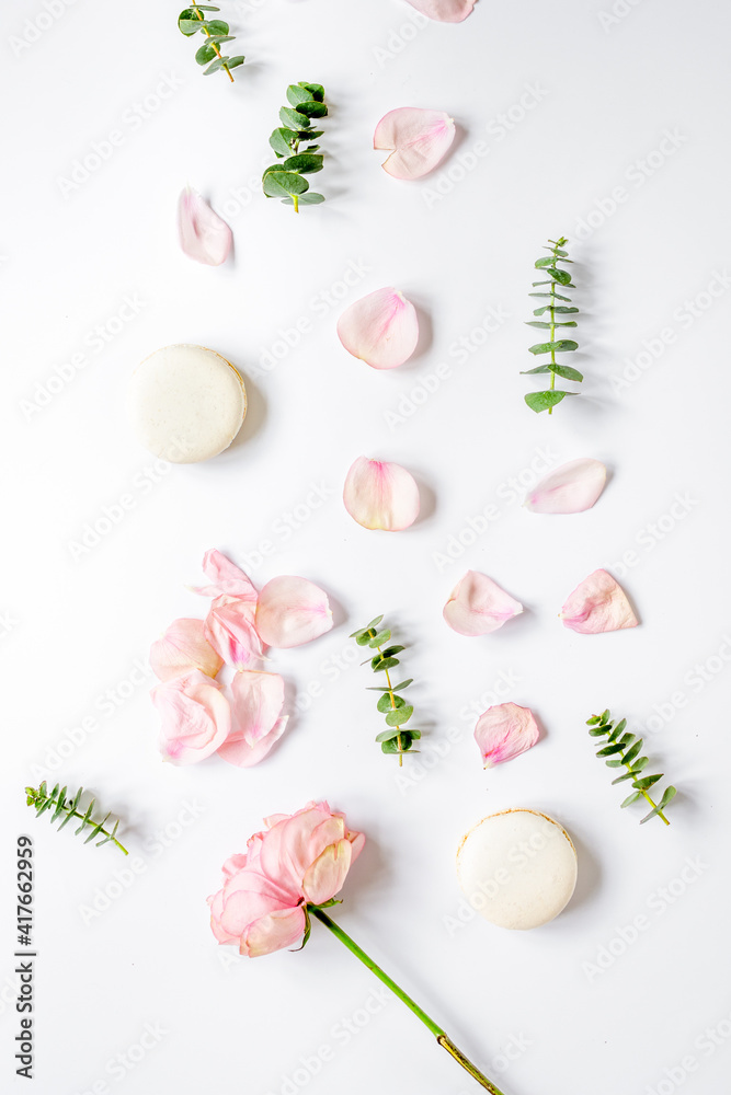 spring pattern with macaroons and flower in soft light top view