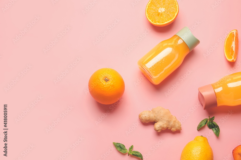 彩色背景的健康产品和果汁瓶