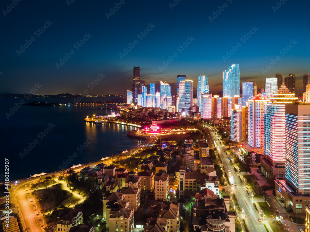 Aerial photography of the night view of the urban architectural landscape of Qingdao, China