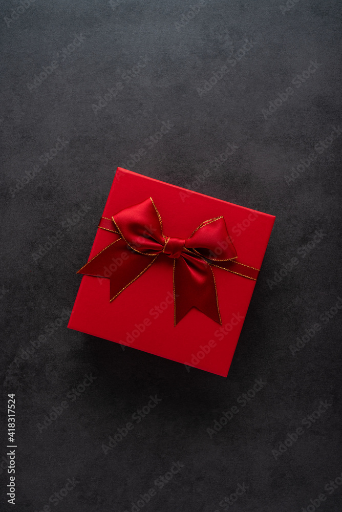 Exquisite gift box on black background