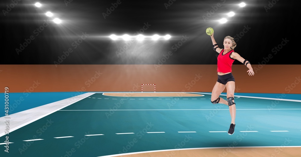 女子手球运动员在手球场上空中投球的构成