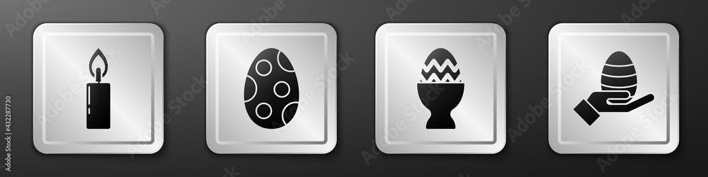 Set Burning candle, Easter egg, Easter egg on a stand and Human hand and easter egg icon. Silver squ