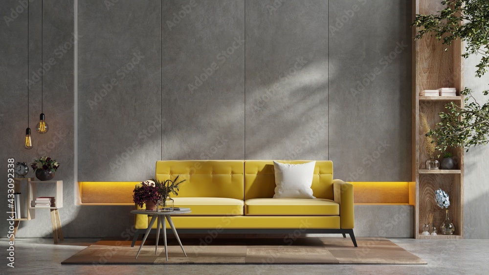 客厅内部的黄色沙发和一张木桌，带有植物和混凝土墙。