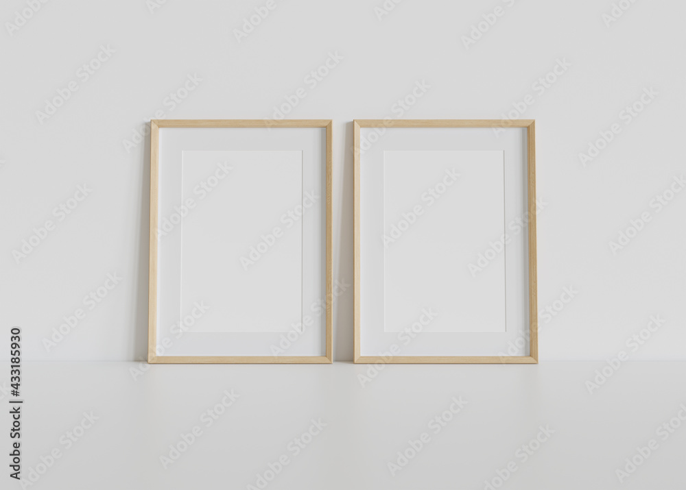 室内模型中两个木框架靠在白色地板上。墙上的图片模板3