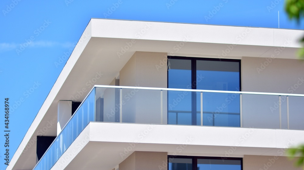 Condominium and apartment building with  symmetrical modern architecture. Detail in modern residenti