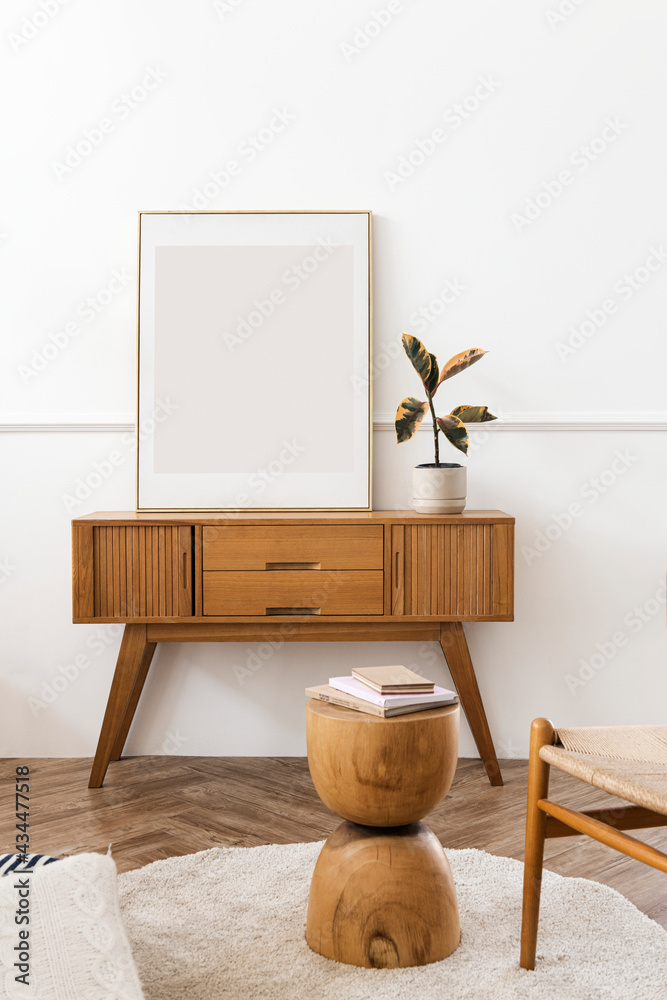 Picture frame on a wooden sideboard table