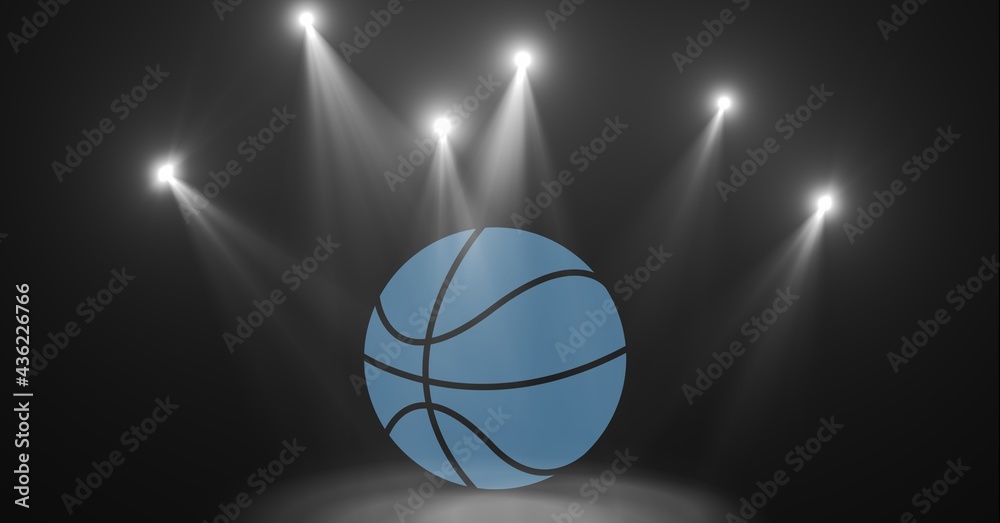 灰色背景聚光灯下的蓝色篮球构图