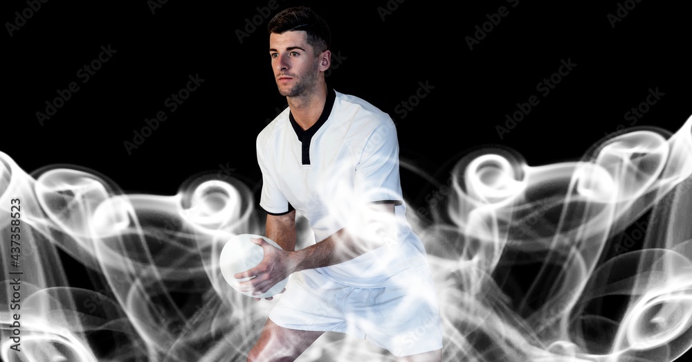 Compostion of caucasian rugby player holding ball on black background with white blur
