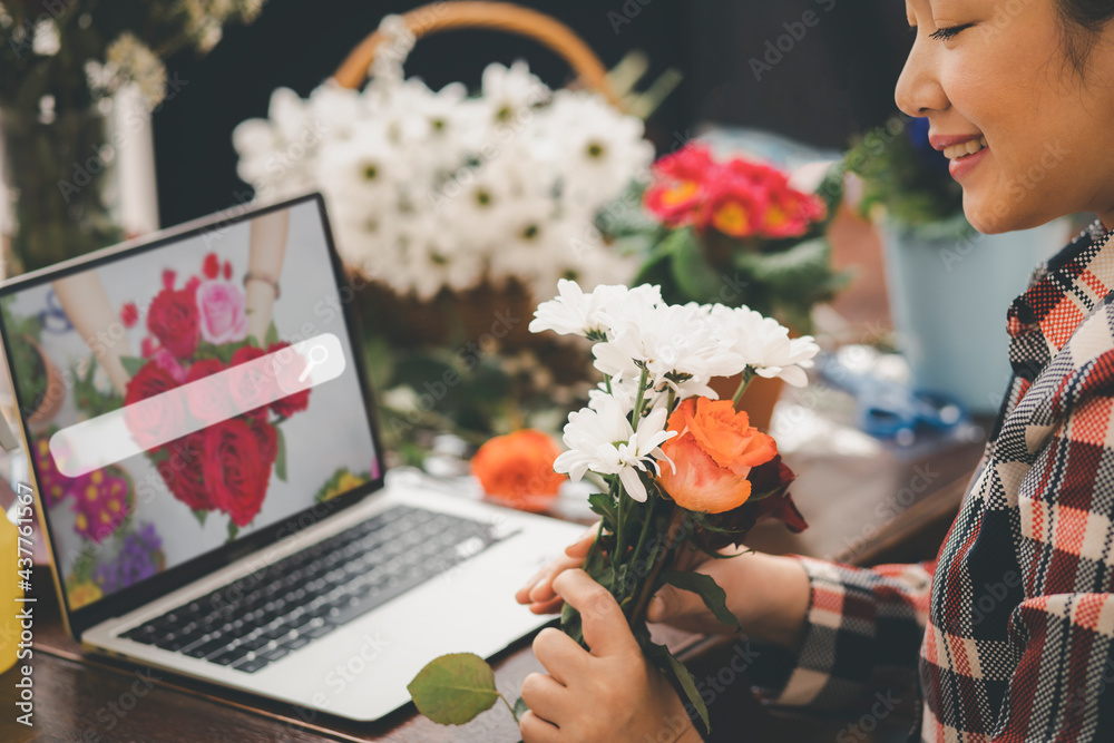 Online home flower arrangement concept, asian woman Smiling florist record video broadcast or course