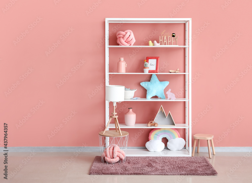 Shelf with toys and decor in childrens room