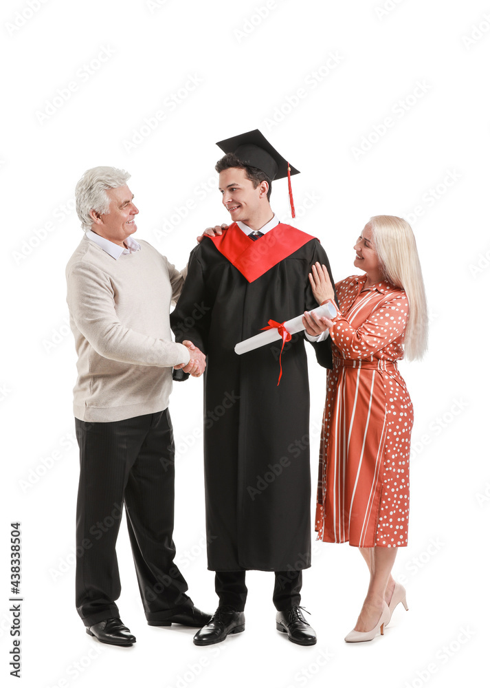 Happy male graduation student with his parents on white background