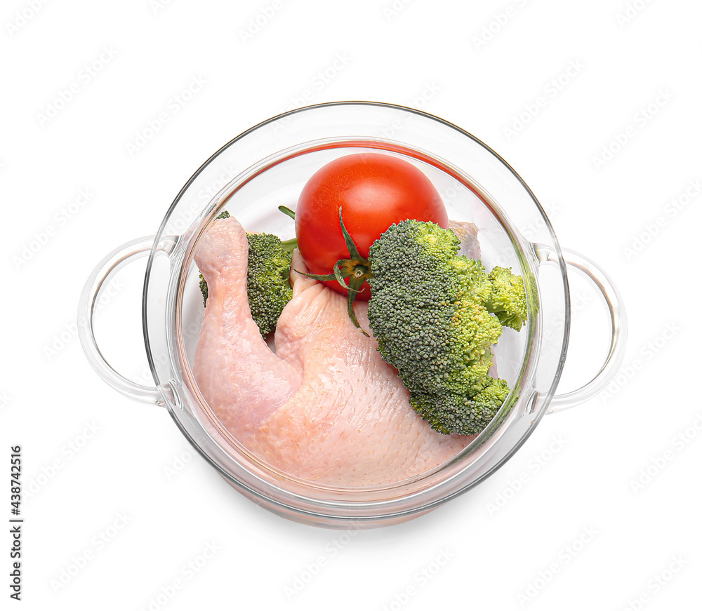 Stylish cooking pot with chicken and vegetables on white background