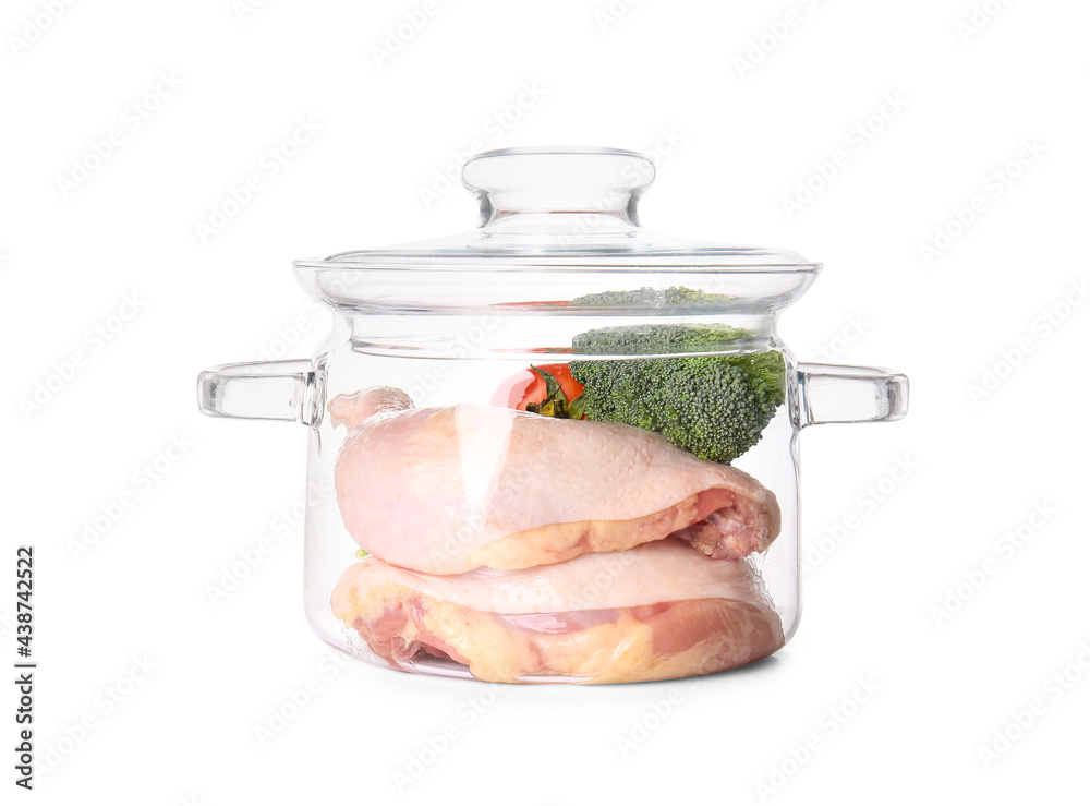Stylish cooking pot with chicken and vegetables on white background