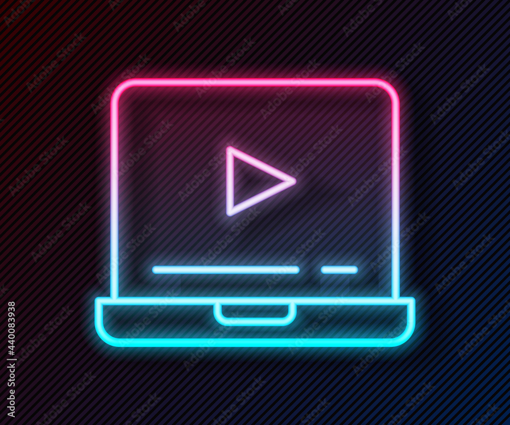 闪闪发光的霓虹灯在线播放视频图标，隔离在黑色背景上。笔记本电脑和带pl的胶卷