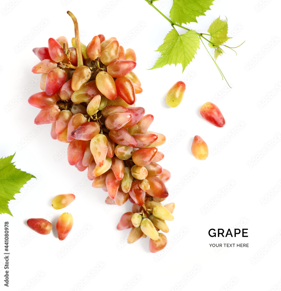 Creative layout made of grape with green leaves on the white background. Flat lay. Food concept.