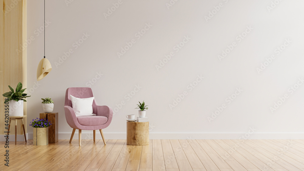 暖色调的客厅墙壁模型，配有粉色扶手椅和植物。