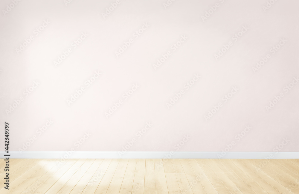 木地板空房间里的浅粉色墙壁