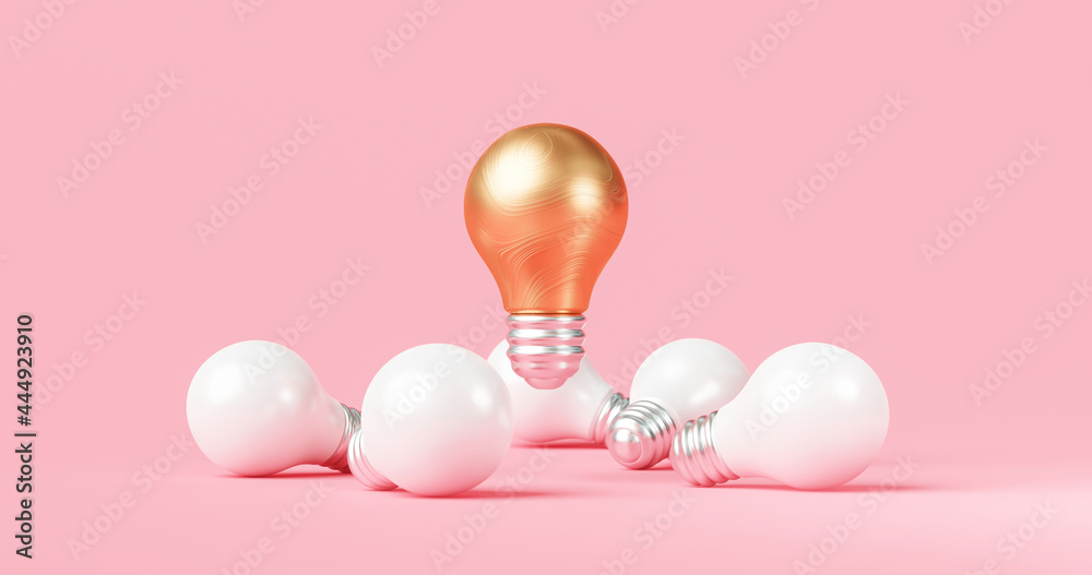 抽象的金色创意灯泡和创新的创意理念，灵感粉色背景上有su