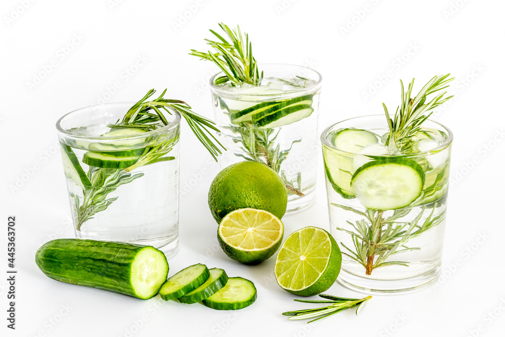 Homemade lemonade with cucumber lemon slices and herbs