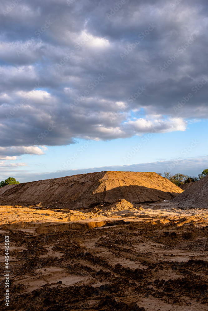 artificial dune made of piled building sand on a construction site in cologne, germany looks like a 