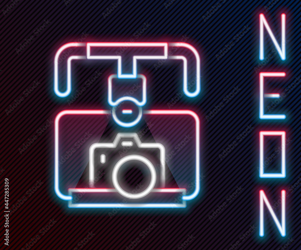 Glowing neon line Gimbal stabilizer with DSLR camera icon isolated on black background. Colorful out