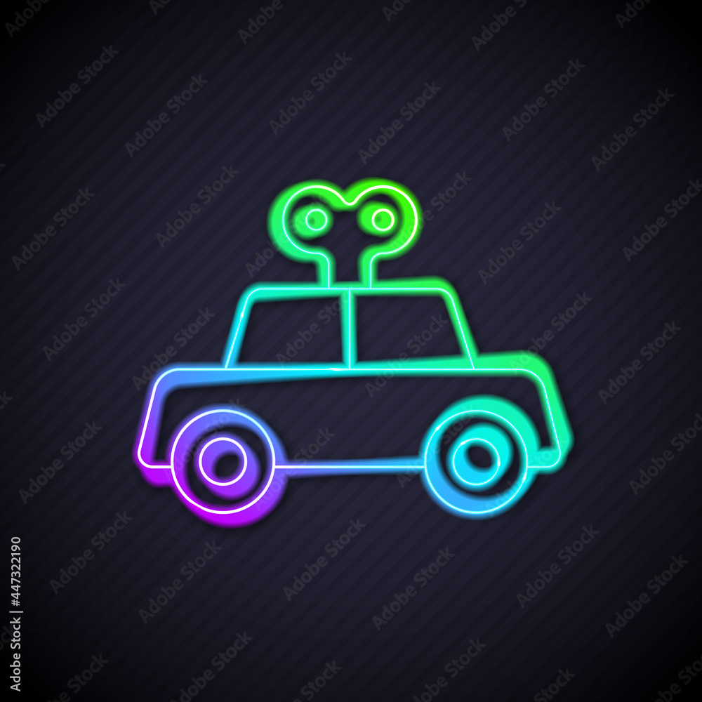 Glowing neon line Toy car icon isolated on black background. Vector