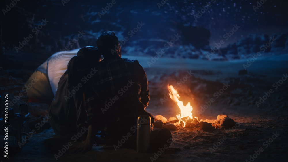 Happy Couple Camping in the Canyon, Sitting Watching Campfire and Starry sky Together, She Rests Her