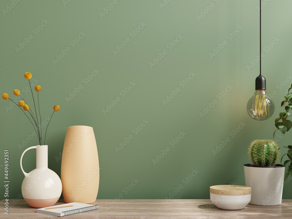 带有花瓶和绿色植物、绿色墙壁和架子的墙壁模型。
