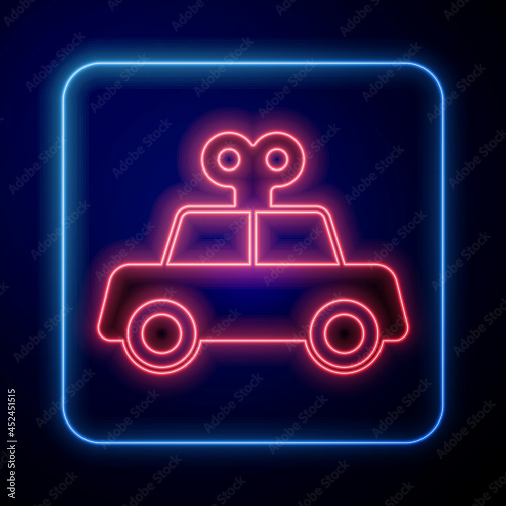 发光霓虹灯玩具车图标隔离在黑色背景上。矢量