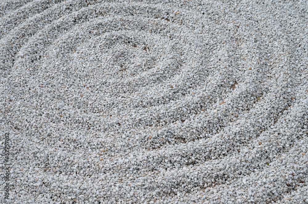 Traditional Detail of Classical Japanese Zen Garden white sand with spherical circles