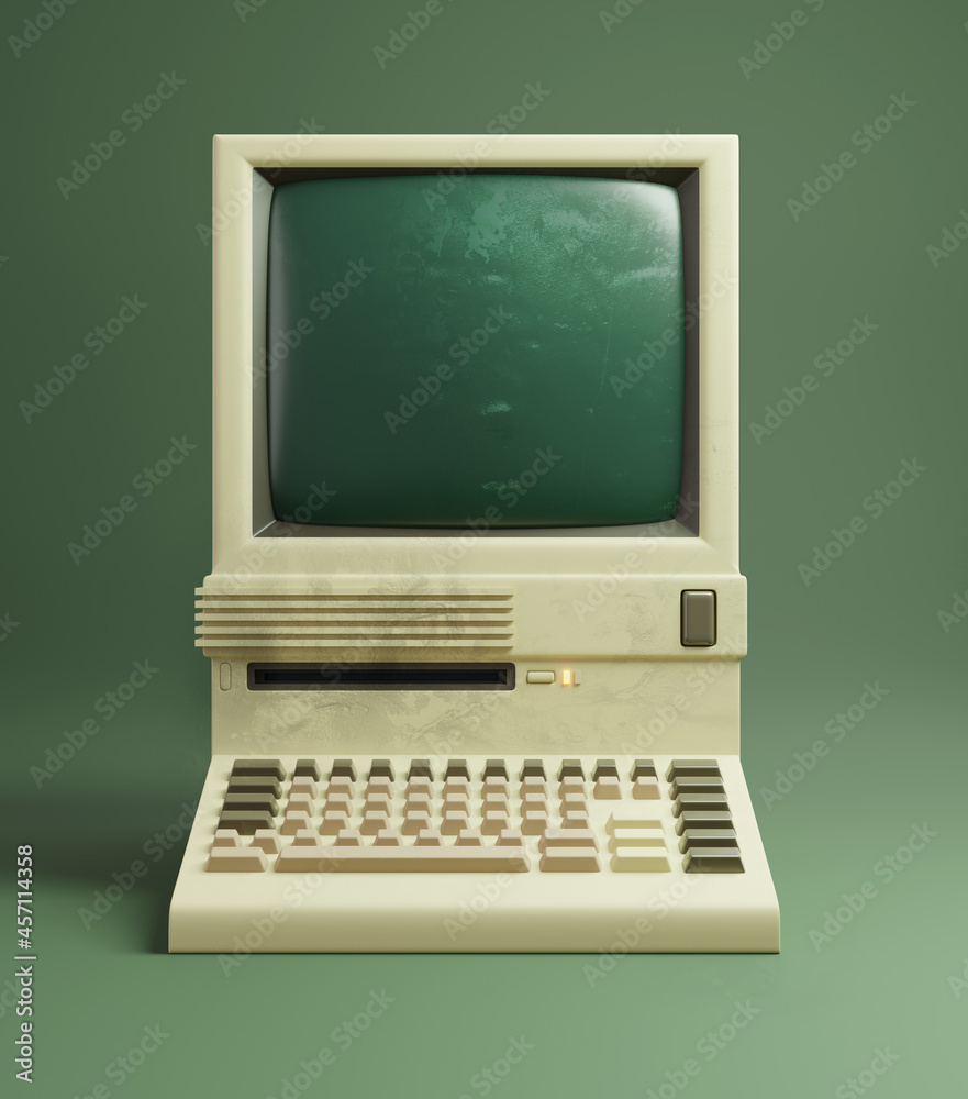 一台20世纪80年代的经典台式电脑，略带泛黄的米色塑料和单色mon
