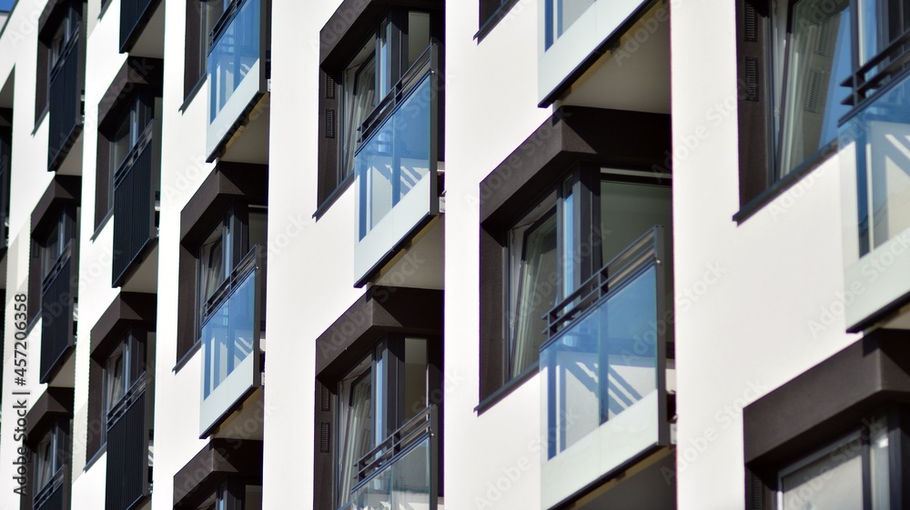Modern apartment building on a sunny day. Architectural details and facade of a modern apartment bui