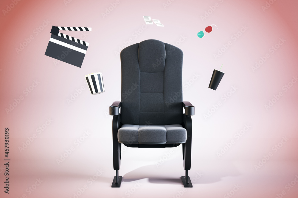 Creative movie theater armchair with pop corn, drinks and other items scattered around on pink backg