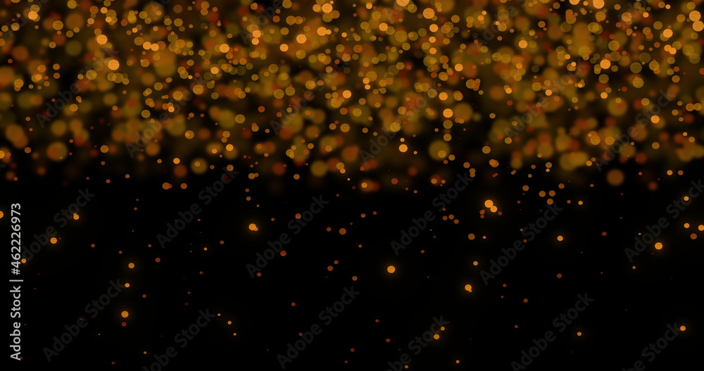 Image of multiple glowing gold spots of light moving in hypnotic motion on black background