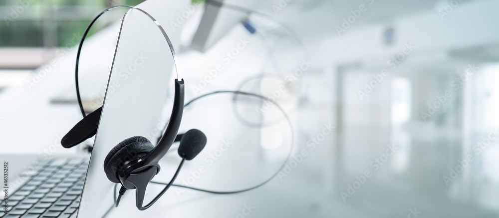 Headset and customer support equipment at call center ready for actively service . Corporate busines